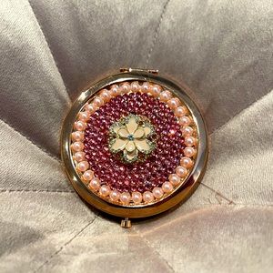 Rose gold compact mirror